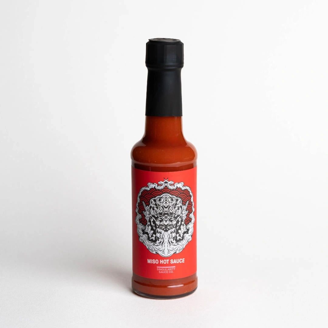 bottle of Singularity Sauce Co. Miso Hot sauce 